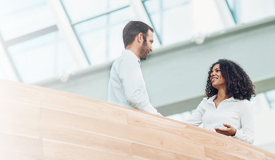 man and woman talking