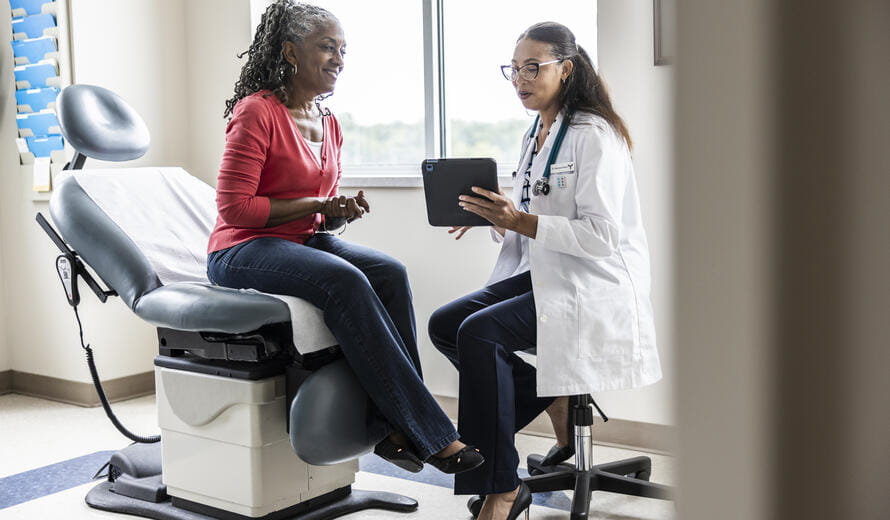 healthcare worker working with a patient