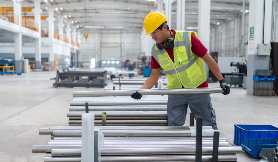 Male Worker Working At Steel Factory